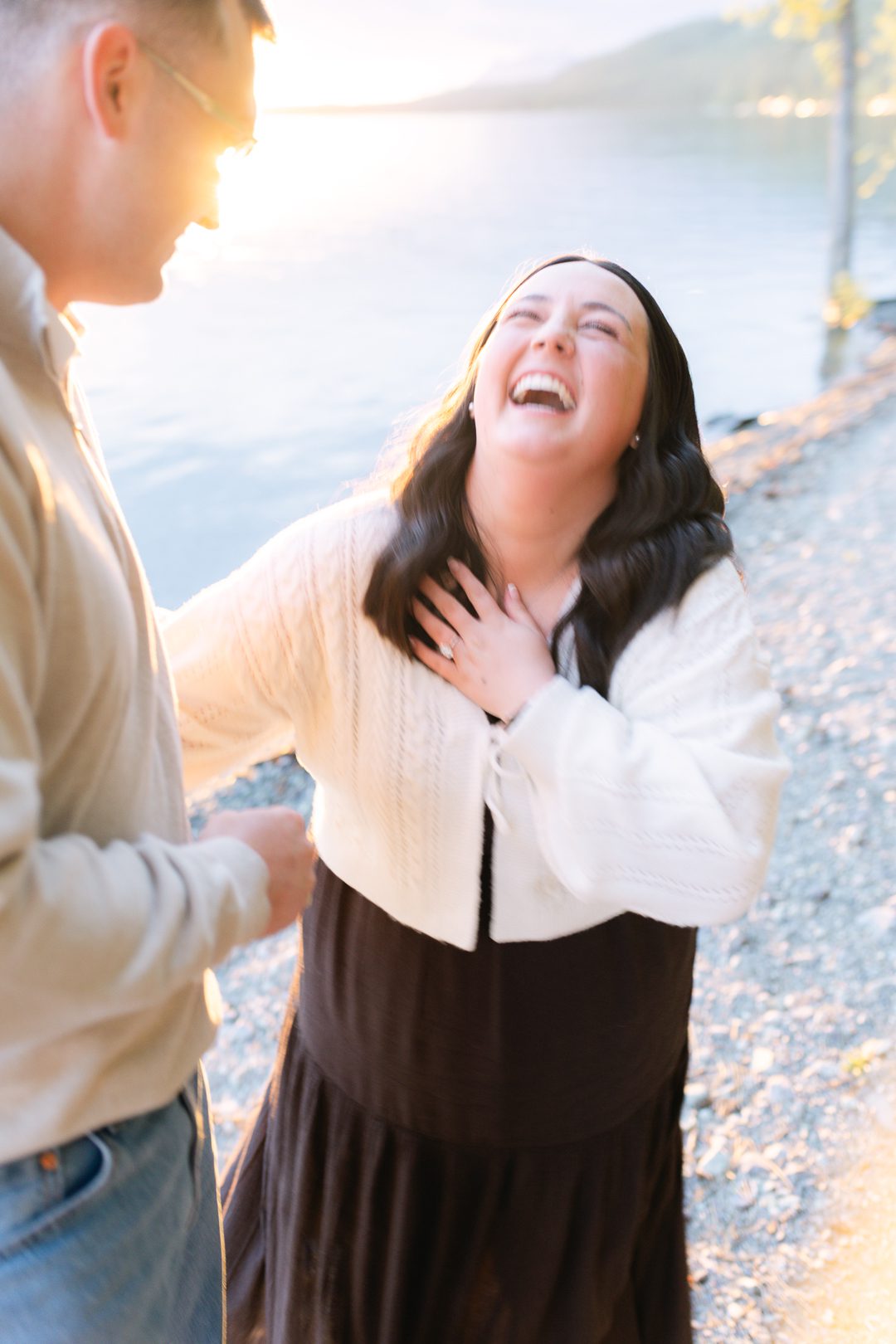 Whitefish surprise proposal on Whitefish Lake at sunset. Get tips on how to plan a surprise proposal, timing, outfit ideas, and how to make it feel natural and unforgettable.