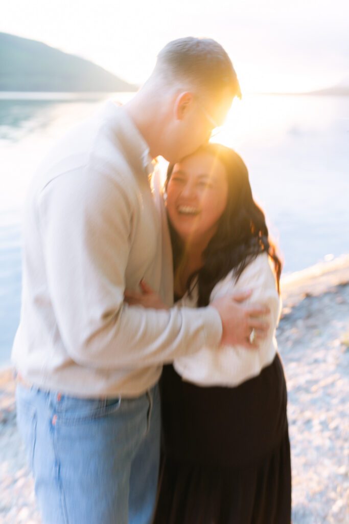 Whitefish surprise proposal on Whitefish Lake at sunset. Get tips on how to plan a surprise proposal, timing, outfit ideas, and how to make it feel natural and unforgettable.