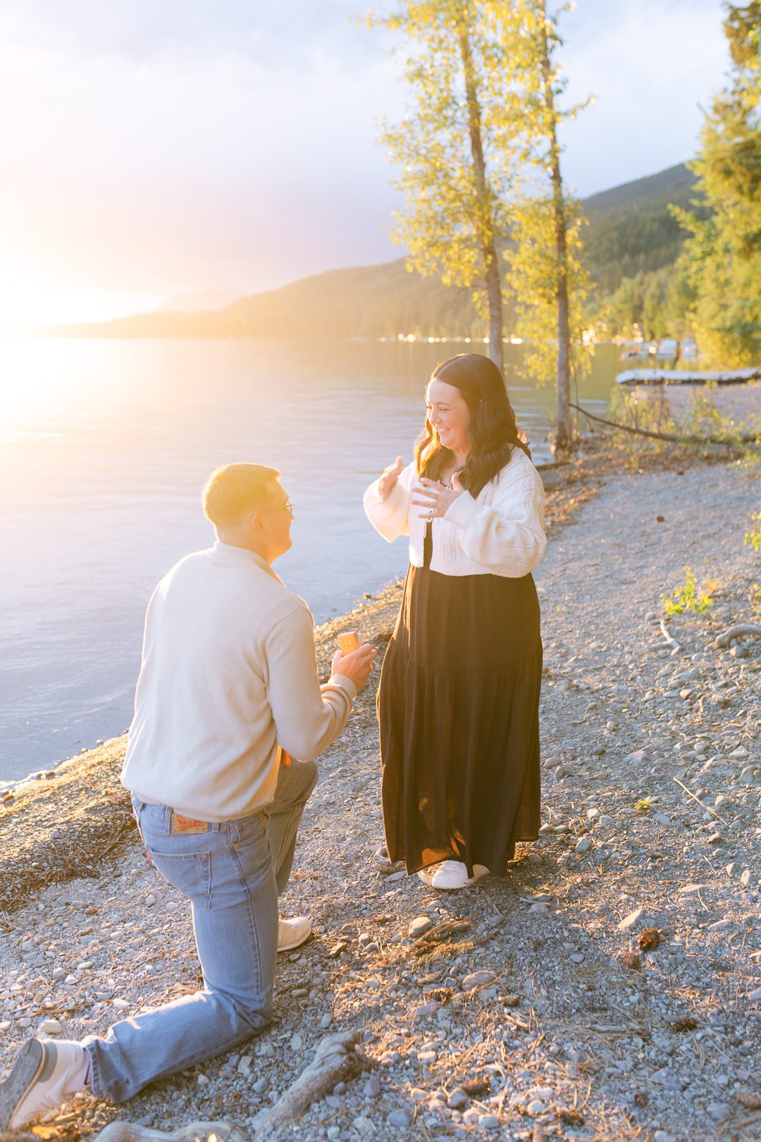 Whitefish surprise proposal on Whitefish Lake at sunset. Get tips on how to plan a surprise proposal, timing, outfit ideas, and how to make it feel natural and unforgettable.