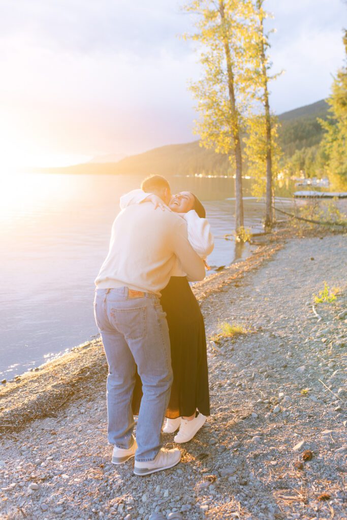 Whitefish surprise proposal on Whitefish Lake at sunset. Get tips on how to plan a surprise proposal, timing, outfit ideas, and how to make it feel natural and unforgettable.