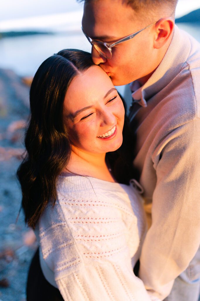 Whitefish surprise proposal on Whitefish Lake at sunset. Get tips on how to plan a surprise proposal, timing, outfit ideas, and how to make it feel natural and unforgettable.