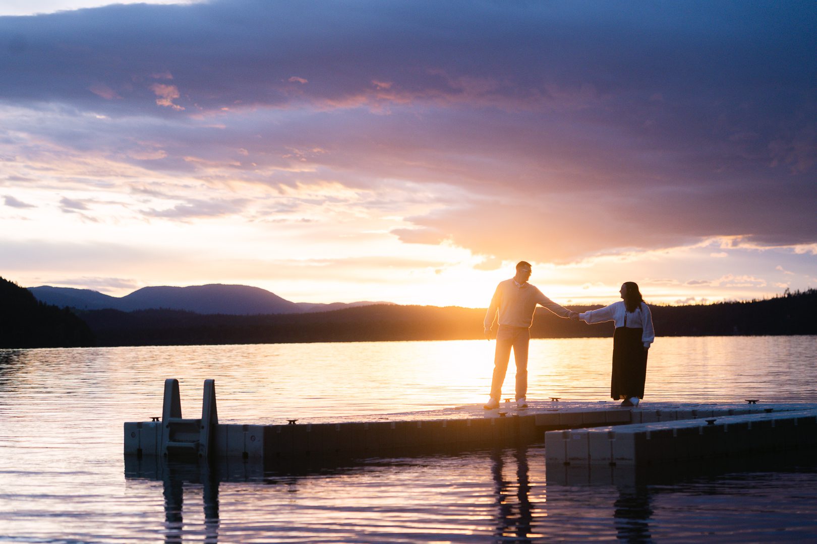 Whitefish surprise proposal on Whitefish Lake at sunset. Get tips on how to plan a surprise proposal, timing, outfit ideas, and how to make it feel natural and unforgettable.