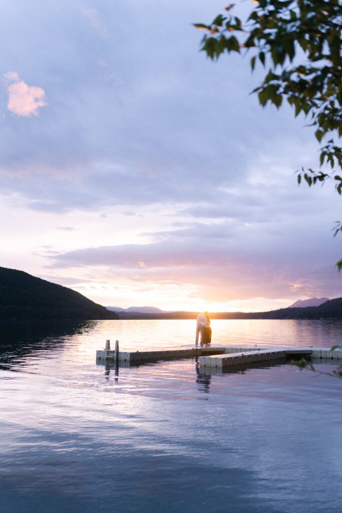 Whitefish surprise proposal on Whitefish Lake at sunset. Get tips on how to plan a surprise proposal, timing, outfit ideas, and how to make it feel natural and unforgettable.