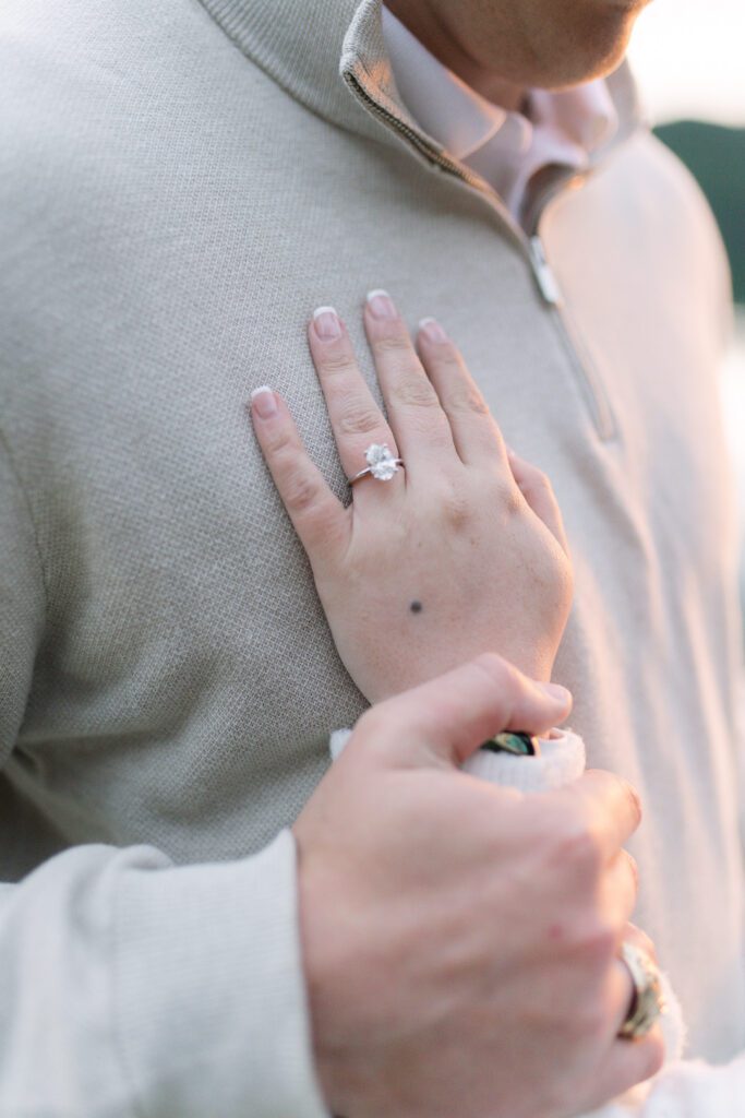 Whitefish surprise proposal on Whitefish Lake at sunset. Get tips on how to plan a surprise proposal, timing, outfit ideas, and how to make it feel natural and unforgettable.