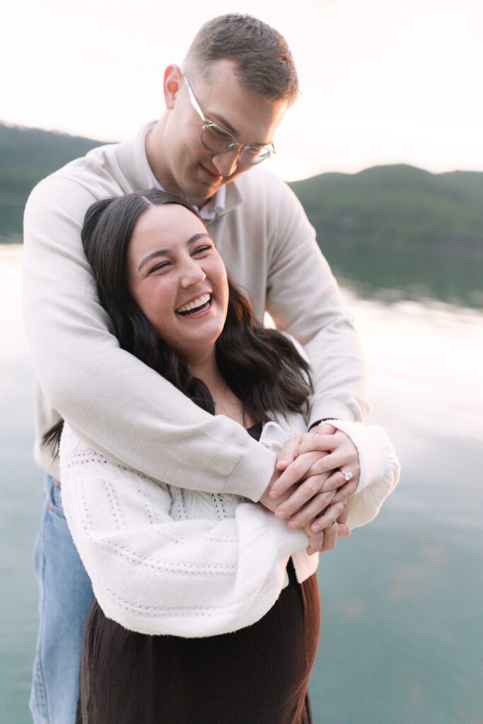 Whitefish surprise proposal on Whitefish Lake at sunset. Get tips on how to plan a surprise proposal, timing, outfit ideas, and how to make it feel natural and unforgettable.