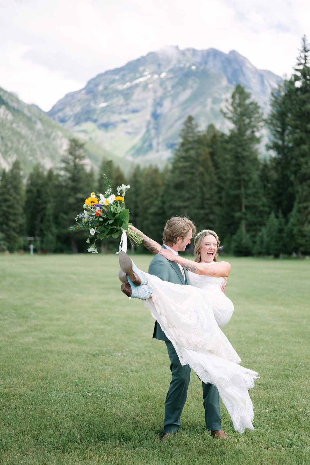 See Katy and Nick’s summer camp wedding in Montana at Luccock Park! Boho wedding style, live band and fun camp-inspired ideas.