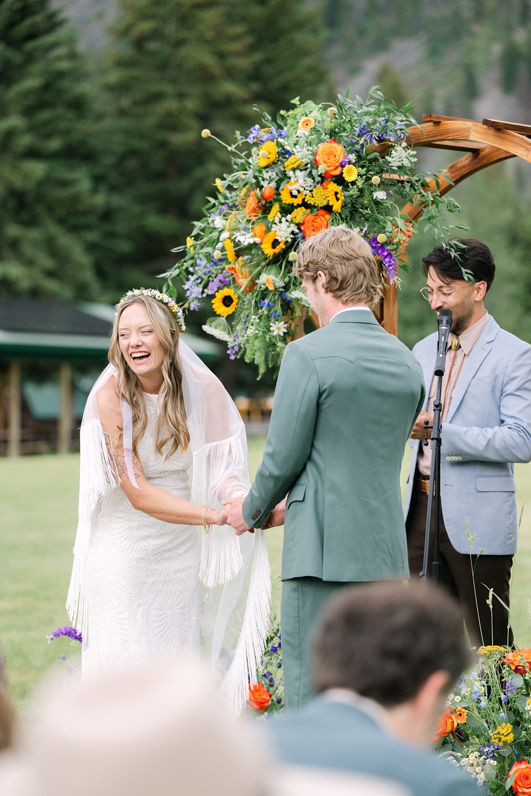 See Katy and Nick’s summer camp wedding in Montana at Luccock Park! Boho wedding style, live band and fun camp-inspired ideas.