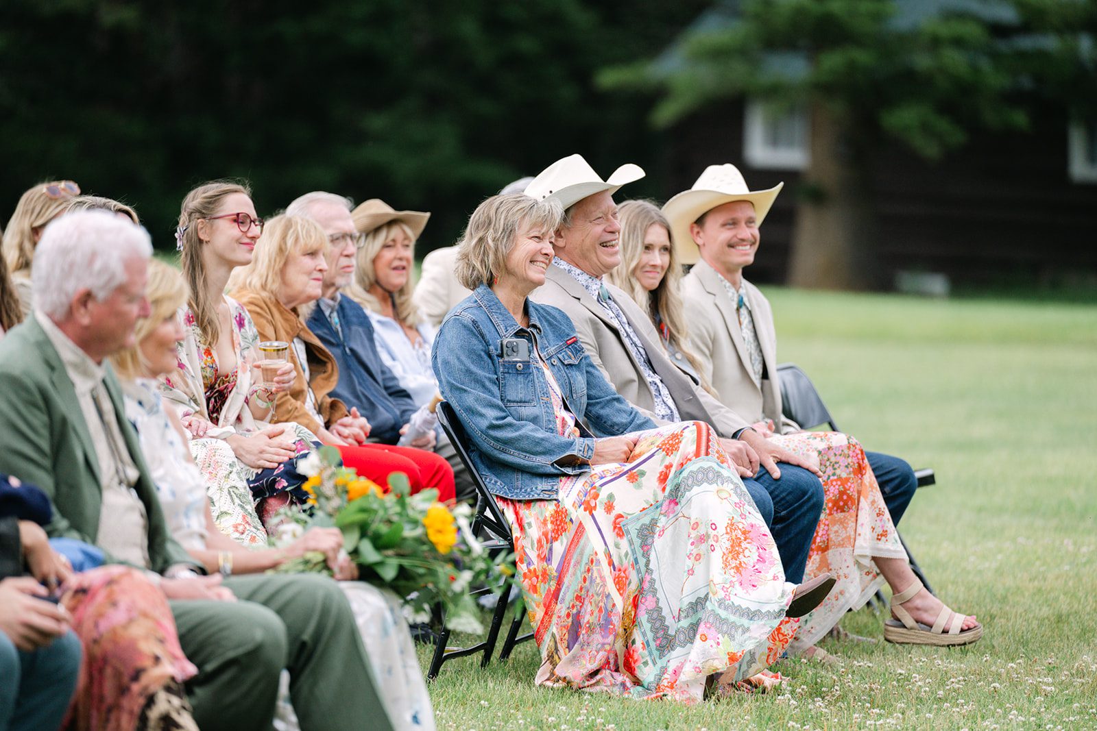 See Katy and Nick’s summer camp wedding in Montana at Luccock Park! Boho wedding style, live band and fun camp-inspired ideas.