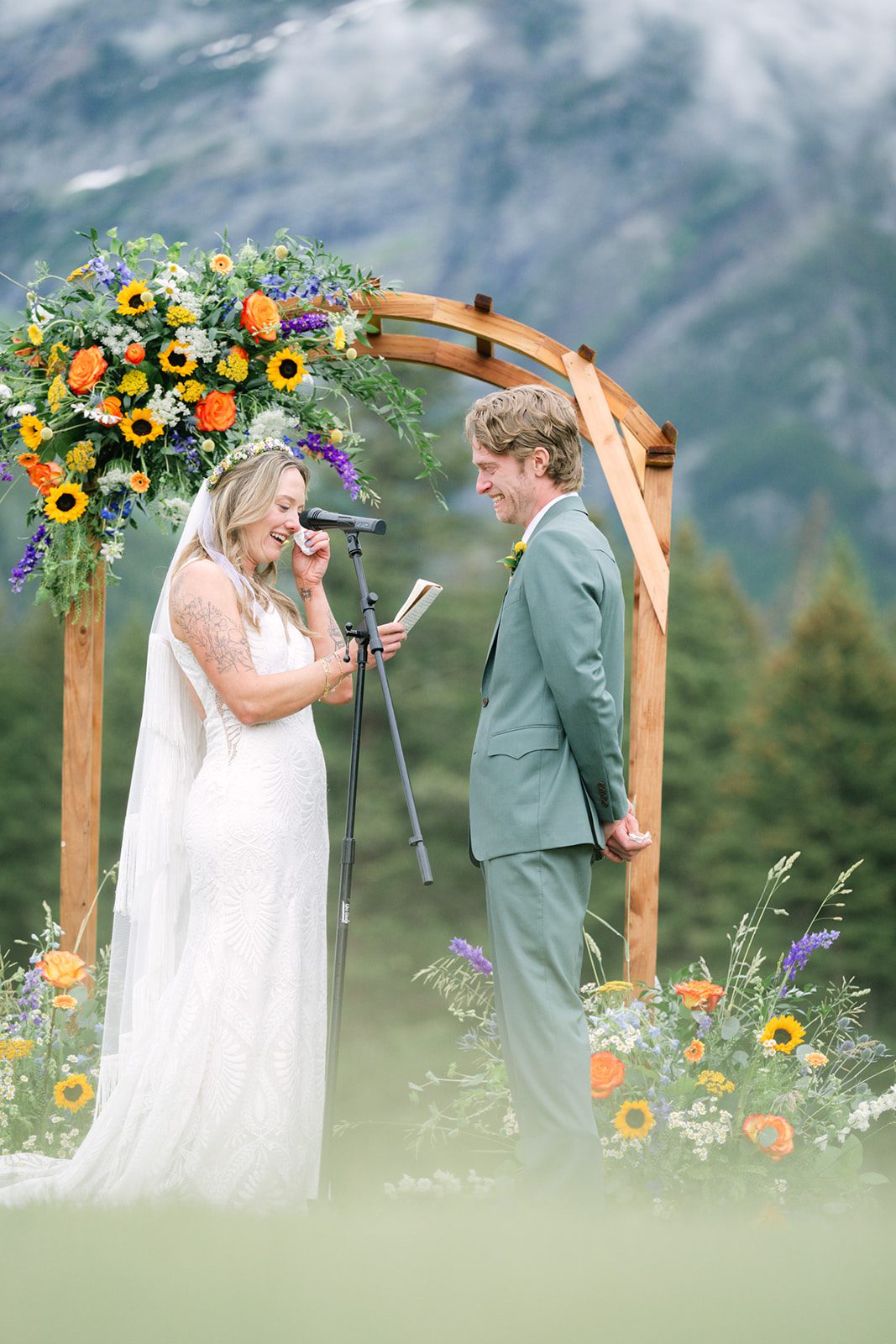 See Katy and Nick’s summer camp wedding in Montana at Luccock Park! Boho wedding style, live band and fun camp-inspired ideas.
