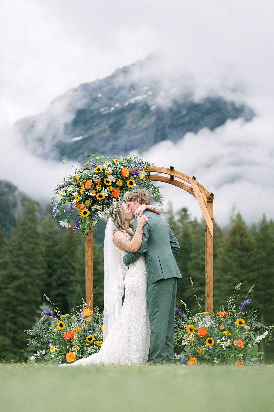 See Katy and Nick’s summer camp wedding in Montana at Luccock Park! Boho wedding style, live band and fun camp-inspired ideas.