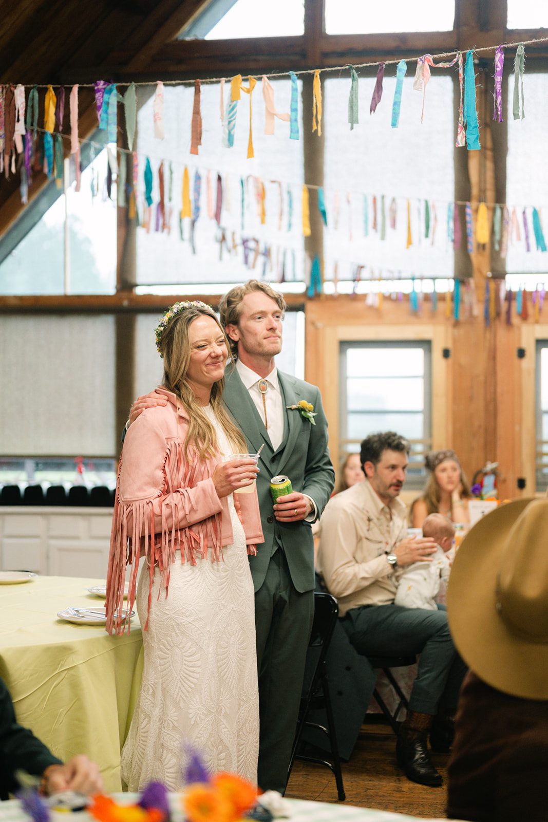 See Katy and Nick’s summer camp wedding in Montana at Luccock Park! Boho wedding style, live band and fun camp-inspired ideas.